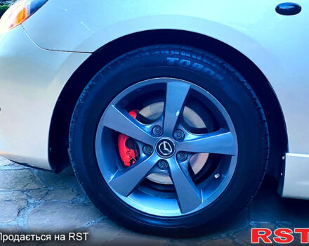 Бежевый Мазда 3, объемом двигателя 1.6 л и пробегом 180 тыс. км за 4750 $, фото 7 на Automoto.ua