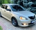 Бежевый Мазда 3, объемом двигателя 1.6 л и пробегом 211 тыс. км за 4800 $, фото 1 на Automoto.ua