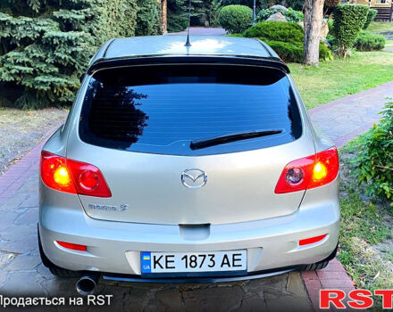 Бежевый Мазда 3, объемом двигателя 1.6 л и пробегом 180 тыс. км за 4750 $, фото 5 на Automoto.ua