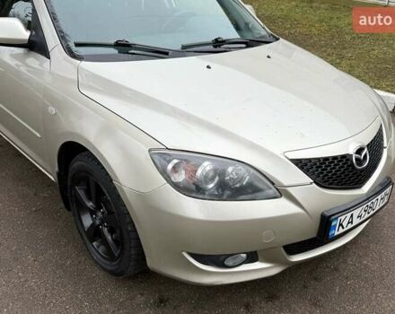 Бежевый Мазда 3, объемом двигателя 1.6 л и пробегом 262 тыс. км за 4250 $, фото 10 на Automoto.ua