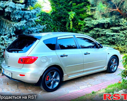 Бежевый Мазда 3, объемом двигателя 1.6 л и пробегом 180 тыс. км за 4750 $, фото 1 на Automoto.ua