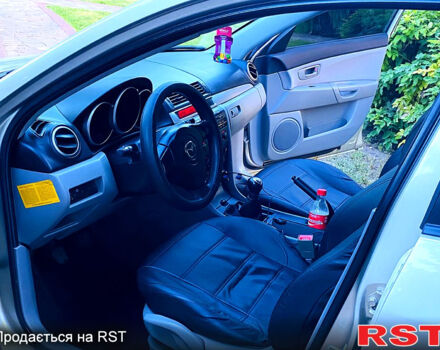 Бежевый Мазда 3, объемом двигателя 1.6 л и пробегом 180 тыс. км за 4750 $, фото 11 на Automoto.ua