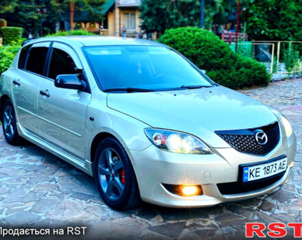 Бежевый Мазда 3, объемом двигателя 1.6 л и пробегом 180 тыс. км за 4750 $, фото 6 на Automoto.ua