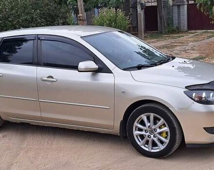 Бежевий Мазда 3, об'ємом двигуна 1.6 л та пробігом 235 тис. км за 4600 $, фото 4 на Automoto.ua