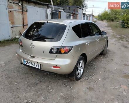 Бежевий Мазда 3, об'ємом двигуна 1.6 л та пробігом 250 тис. км за 4550 $, фото 2 на Automoto.ua
