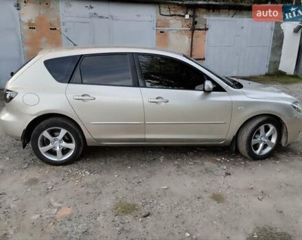 Бежевий Мазда 3, об'ємом двигуна 1.6 л та пробігом 250 тис. км за 4550 $, фото 3 на Automoto.ua