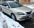Бежевый Мазда 3, объемом двигателя 1.6 л и пробегом 244 тыс. км за 4650 $, фото 1 на Automoto.ua