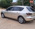 Бежевый Мазда 3, объемом двигателя 1.6 л и пробегом 235 тыс. км за 4600 $, фото 4 на Automoto.ua