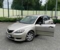 Бежевий Мазда 3, об'ємом двигуна 0 л та пробігом 245 тис. км за 3300 $, фото 1 на Automoto.ua