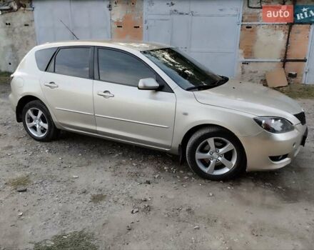 Бежевий Мазда 3, об'ємом двигуна 1.6 л та пробігом 250 тис. км за 4550 $, фото 6 на Automoto.ua