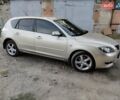 Бежевий Мазда 3, об'ємом двигуна 1.6 л та пробігом 250 тис. км за 4550 $, фото 6 на Automoto.ua