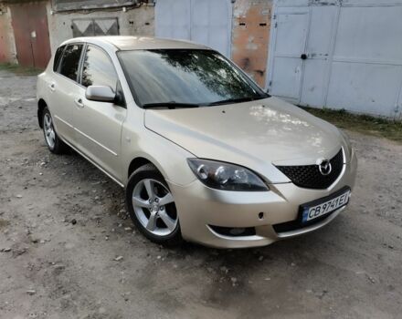 Бежевый Мазда 3, объемом двигателя 1.6 л и пробегом 250 тыс. км за 4550 $, фото 1 на Automoto.ua