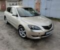 Бежевый Мазда 3, объемом двигателя 1.6 л и пробегом 250 тыс. км за 4550 $, фото 1 на Automoto.ua