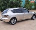 Бежевый Мазда 3, объемом двигателя 1.6 л и пробегом 235 тыс. км за 4600 $, фото 8 на Automoto.ua
