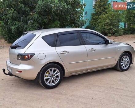 Бежевий Мазда 3, об'ємом двигуна 1.6 л та пробігом 235 тис. км за 4600 $, фото 5 на Automoto.ua