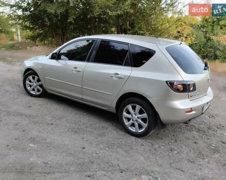 Бежевий Мазда 3, об'ємом двигуна 1.6 л та пробігом 250 тис. км за 4550 $, фото 1 на Automoto.ua