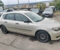 Бежевый Мазда 3, объемом двигателя 1.3 л и пробегом 216 тыс. км за 1950 $, фото 5 на Automoto.ua