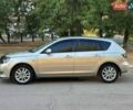 Бежевый Мазда 3, объемом двигателя 1.6 л и пробегом 235 тыс. км за 4600 $, фото 3 на Automoto.ua