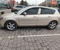 Бежевый Мазда 3, объемом двигателя 1.6 л и пробегом 158 тыс. км за 4500 $, фото 1 на Automoto.ua