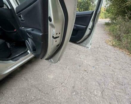 Бежевий Мазда 3, об'ємом двигуна 1.6 л та пробігом 250 тис. км за 4600 $, фото 8 на Automoto.ua