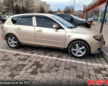 Бежевый Мазда 3, объемом двигателя 1.6 л и пробегом 157 тыс. км за 4500 $, фото 2 на Automoto.ua