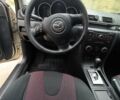 Бежевый Мазда 3, объемом двигателя 1.6 л и пробегом 158 тыс. км за 4500 $, фото 11 на Automoto.ua