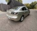 Бежевий Мазда 3, об'ємом двигуна 1.6 л та пробігом 250 тис. км за 4600 $, фото 3 на Automoto.ua