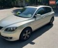 Бежевый Мазда 3, объемом двигателя 1.6 л и пробегом 194 тыс. км за 4000 $, фото 1 на Automoto.ua