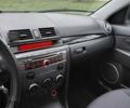 Бежевый Мазда 3, объемом двигателя 1.6 л и пробегом 230 тыс. км за 5200 $, фото 8 на Automoto.ua