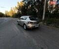 Бежевый Мазда 3, объемом двигателя 1.6 л и пробегом 264 тыс. км за 4500 $, фото 1 на Automoto.ua