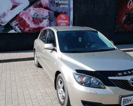 Бежевий Мазда 3, об'ємом двигуна 1.56 л та пробігом 210 тис. км за 5500 $, фото 5 на Automoto.ua