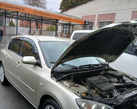 Бежевый Мазда 3, объемом двигателя 1.6 л и пробегом 143 тыс. км за 6200 $, фото 10 на Automoto.ua