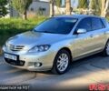 Бежевый Мазда 3, объемом двигателя 1.6 л и пробегом 147 тыс. км за 5999 $, фото 1 на Automoto.ua