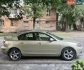 Бежевий Мазда 3, об'ємом двигуна 2 л та пробігом 270 тис. км за 3850 $, фото 1 на Automoto.ua