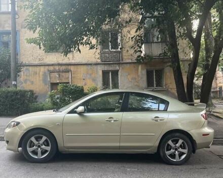 Бежевий Мазда 3, об'ємом двигуна 2 л та пробігом 270 тис. км за 3850 $, фото 1 на Automoto.ua