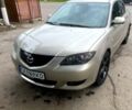 Бежевый Мазда 3, объемом двигателя 1.6 л и пробегом 230 тыс. км за 4300 $, фото 1 на Automoto.ua