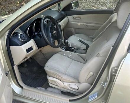 Бежевий Мазда 3, об'ємом двигуна 2 л та пробігом 270 тис. км за 3850 $, фото 5 на Automoto.ua