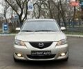 Бежевый Мазда 3, объемом двигателя 1.6 л и пробегом 265 тыс. км за 4999 $, фото 1 на Automoto.ua