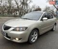 Бежевый Мазда 3, объемом двигателя 1.6 л и пробегом 265 тыс. км за 4999 $, фото 3 на Automoto.ua