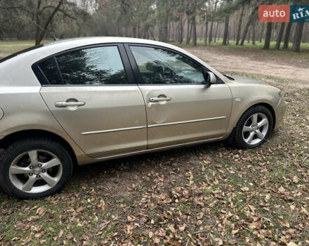 Бежевий Мазда 3, об'ємом двигуна 1.6 л та пробігом 252 тис. км за 4000 $, фото 3 на Automoto.ua