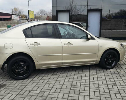 Бежевый Мазда 3, объемом двигателя 1.6 л и пробегом 236 тыс. км за 4900 $, фото 6 на Automoto.ua