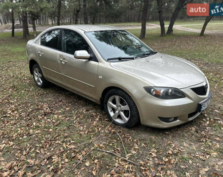 Бежевий Мазда 3, об'ємом двигуна 1.6 л та пробігом 252 тис. км за 4000 $, фото 4 на Automoto.ua