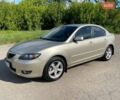 Бежевий Мазда 3, об'ємом двигуна 1.6 л та пробігом 174 тис. км за 4999 $, фото 1 на Automoto.ua