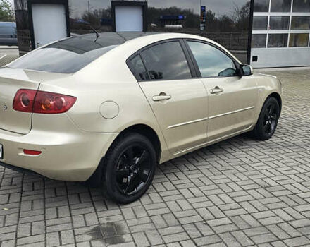 Бежевый Мазда 3, объемом двигателя 1.6 л и пробегом 236 тыс. км за 4900 $, фото 7 на Automoto.ua