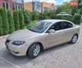 Бежевый Мазда 3, объемом двигателя 1.6 л и пробегом 247 тыс. км за 5000 $, фото 1 на Automoto.ua