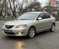 Бежевый Мазда 3, объемом двигателя 1.6 л и пробегом 265 тыс. км за 4999 $, фото 1 на Automoto.ua