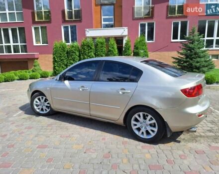 Бежевий Мазда 3, об'ємом двигуна 1.6 л та пробігом 247 тис. км за 5300 $, фото 12 на Automoto.ua