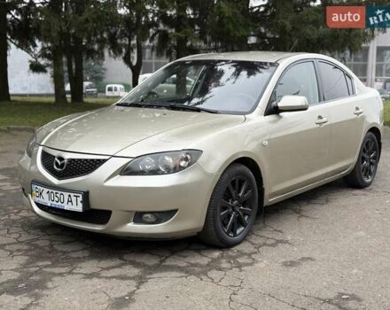 Бежевый Мазда 3, объемом двигателя 1.6 л и пробегом 220 тыс. км за 3499 $, фото 2 на Automoto.ua