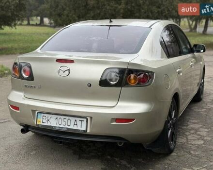 Бежевый Мазда 3, объемом двигателя 1.6 л и пробегом 220 тыс. км за 3499 $, фото 23 на Automoto.ua
