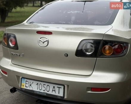 Бежевый Мазда 3, объемом двигателя 1.6 л и пробегом 220 тыс. км за 3499 $, фото 24 на Automoto.ua